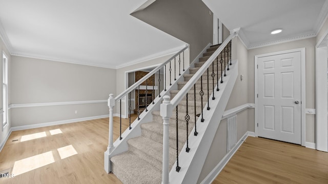 1524 Wedgewood Dr, Graham, NC 27253 - stairs featuring ornamental molding and wood finished floors