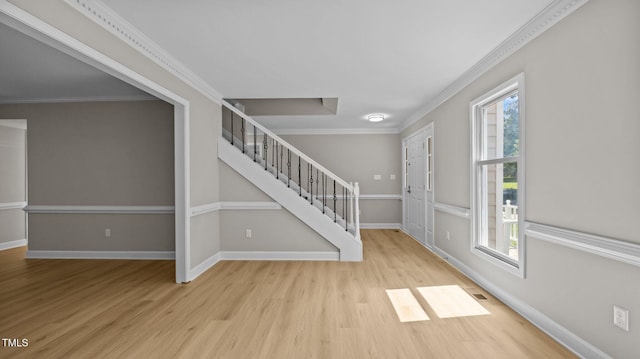 1524 Wedgewood Dr, Graham, NC 27253 - foyer entrance featuring wood finished floors, stairway, and ornamental molding