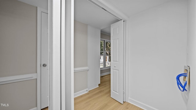 1524 Wedgewood Dr, Graham, NC 27253 - hallway with wood finished floors and baseboards