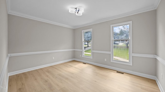 1524 Wedgewood Dr, Graham, NC 27253 - unfurnished room with crown molding and light wood-style floors