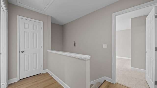 1524 Wedgewood Dr, Graham, NC 27253 - hallway featuring an upstairs landing, attic access, and wood finished floors