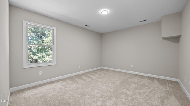 1524 Wedgewood Dr, Graham, NC 27253 - empty room featuring baseboards and light carpet