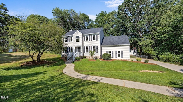 1524 Wedgewood Dr, Graham, NC 27253 - colonial house featuring a front lawn and concrete driveway