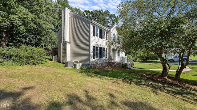 1524 Wedgewood Dr, Graham, NC 27253 - view of side of home featuring a chimney and a lawn