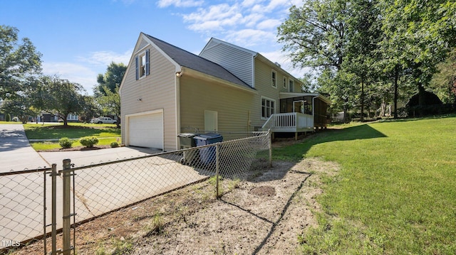 1524 Wedgewood Dr, Graham, NC 27253 - view of side of home with driveway and a garage