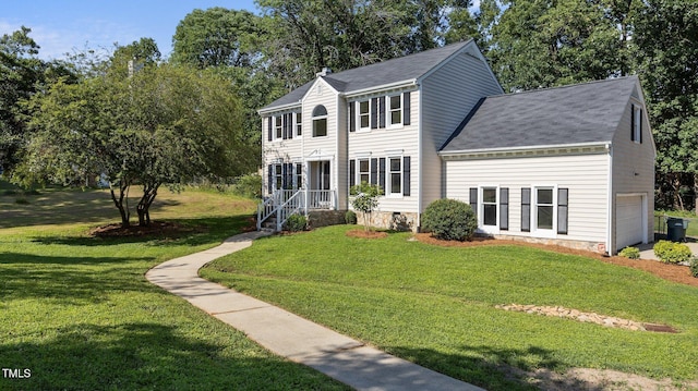 1524 Wedgewood Dr, Graham, NC 27253 - colonial-style house with a shingled roof and a front lawn