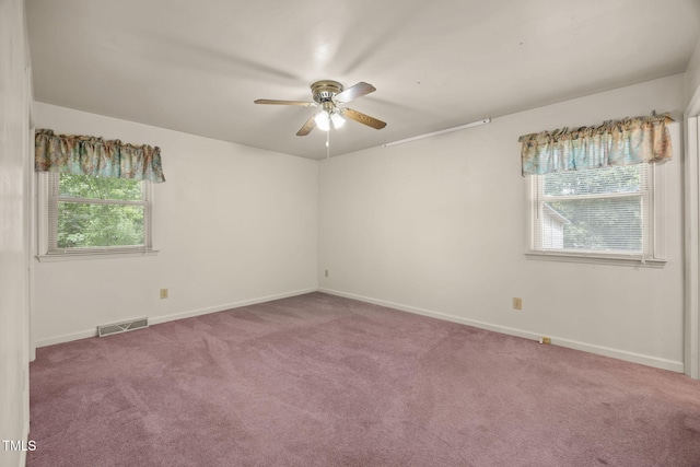 1105 Fontaine Rd, Roxboro, NC 27574 - carpeted spare room featuring a ceiling fan and baseboards