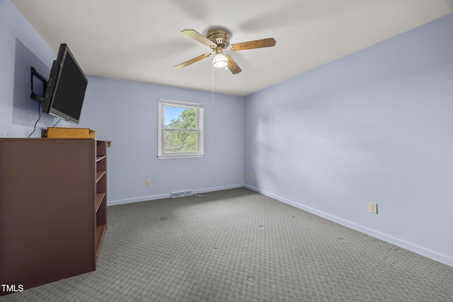 1105 Fontaine Rd, Roxboro, NC 27574 - unfurnished bedroom featuring carpet and ceiling fan