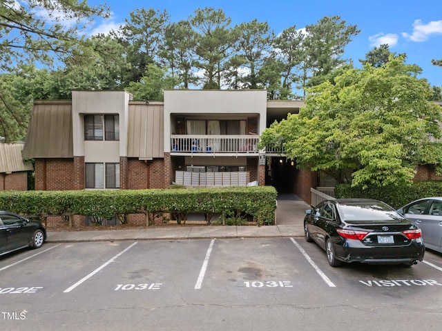 500 Umstead Dr Unit 103E, Chapel Hill, NC 27516 - view of building exterior with uncovered parking