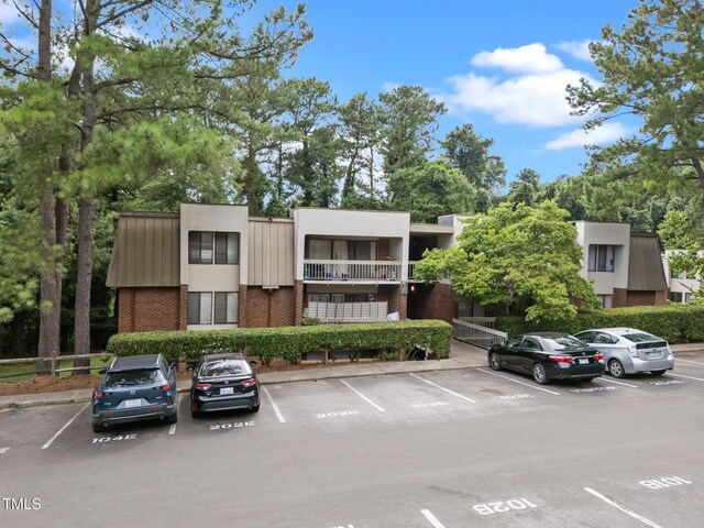 500 Umstead Dr Unit 103E, Chapel Hill, NC 27516 - view of building exterior featuring uncovered parking
