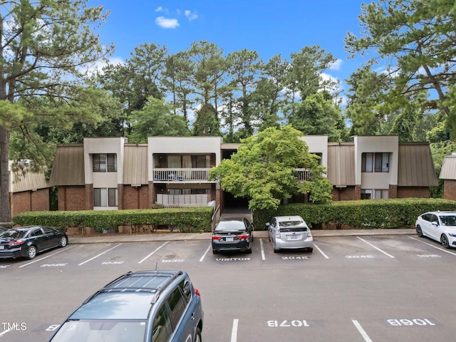 500 Umstead Dr Unit 103E, Chapel Hill, NC 27516 - view of property featuring uncovered parking