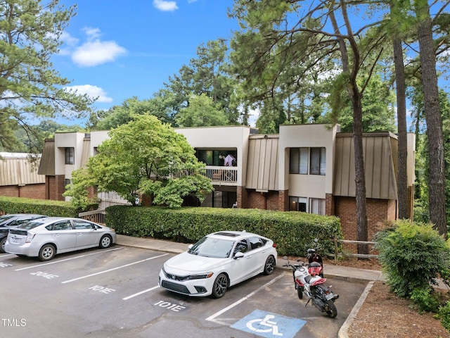 500 Umstead Dr Unit 103E, Chapel Hill, NC 27516 - view of building exterior with uncovered parking