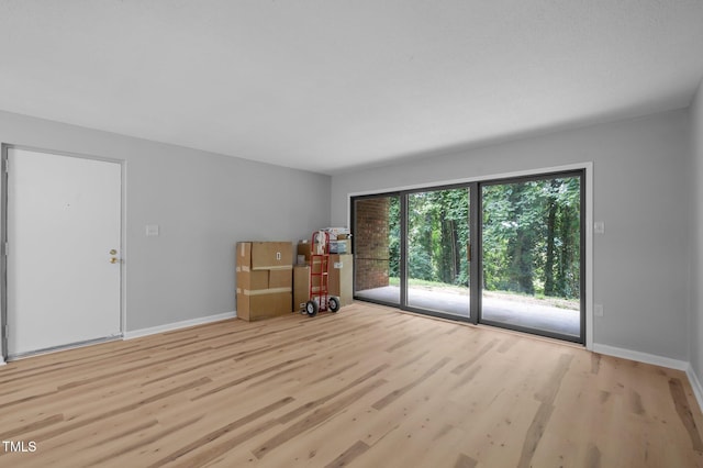 500 Umstead Dr Unit 103E, Chapel Hill, NC 27516 - unfurnished room with wood finished floors and baseboards