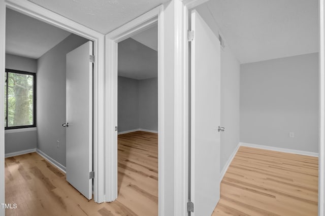 500 Umstead Dr Unit 103E, Chapel Hill, NC 27516 - hall with light wood-style flooring and baseboards