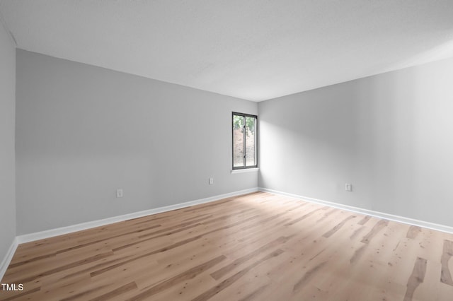 500 Umstead Dr Unit 103E, Chapel Hill, NC 27516 - unfurnished room with light wood finished floors and baseboards