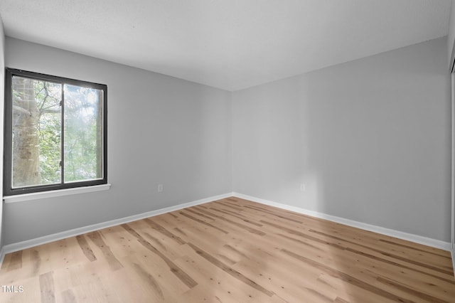 500 Umstead Dr Unit 103E, Chapel Hill, NC 27516 - unfurnished room featuring wood finished floors and baseboards