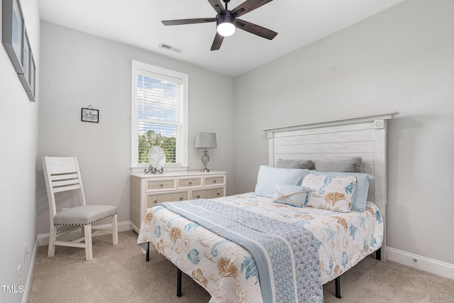 220 W Amber Oak Dr, Selma, NC 27576 - carpeted bedroom with baseboards and ceiling fan