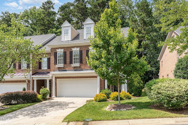 4060 Barton Park Pl, Raleigh, NC 27613 - view of front of property featuring an attached garage, brick siding, driveway, and a shingled roof