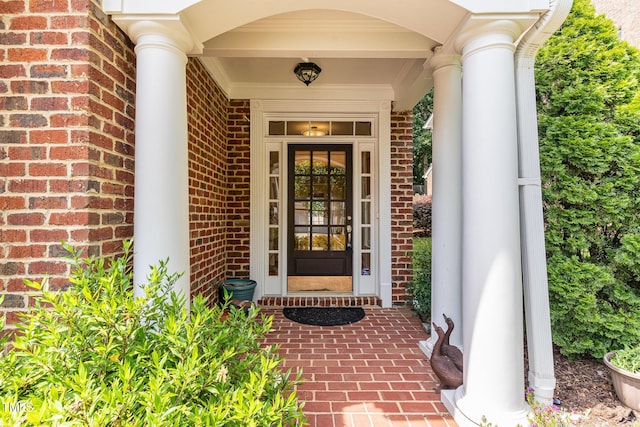 4060 Barton Park Pl, Raleigh, NC 27613 - view of exterior entry featuring brick siding and covered porch