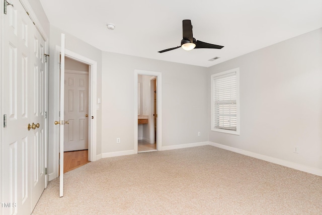 4060 Barton Park Pl, Raleigh, NC 27613 - unfurnished bedroom with light carpet, a closet, ensuite bath, and a ceiling fan