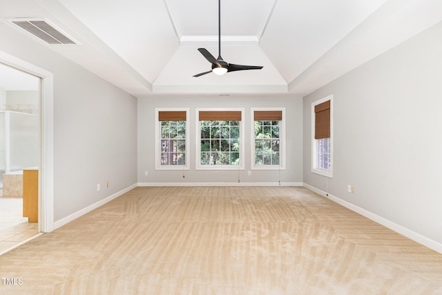 4060 Barton Park Pl, Raleigh, NC 27613 - spare room with ceiling fan, light carpet, a raised ceiling, and vaulted ceiling
