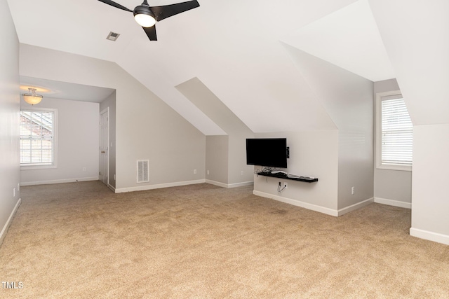 4060 Barton Park Pl, Raleigh, NC 27613 - unfurnished living room with carpet floors, lofted ceiling, ceiling fan, and plenty of natural light