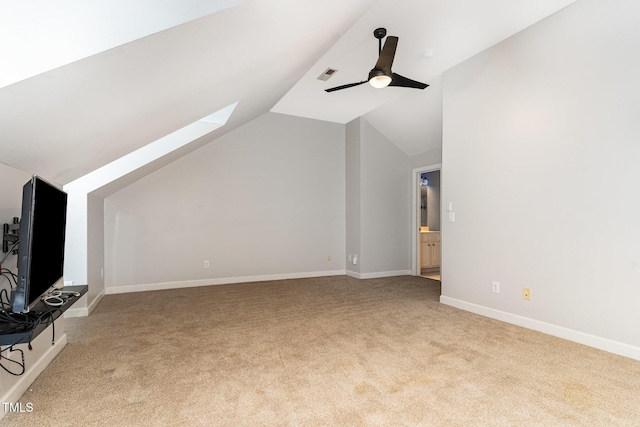 4060 Barton Park Pl, Raleigh, NC 27613 - unfurnished living room with light colored carpet, vaulted ceiling, and ceiling fan