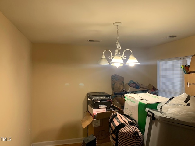 929 Morreene Rd Unit C-14, Durham, NC 27705 - dining space featuring a chandelier