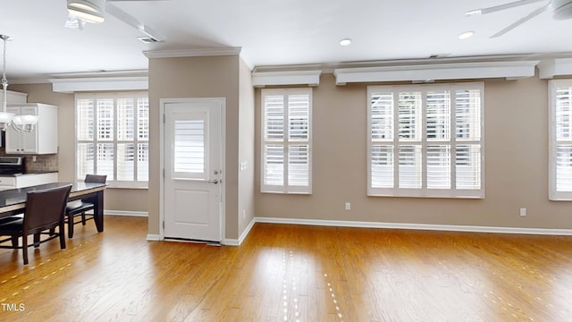 112 Salmon River Dr, Durham, NC 27705 - foyer with a ceiling fan, ornamental molding, light wood-style floors, healthy amount of natural light, and recessed lighting