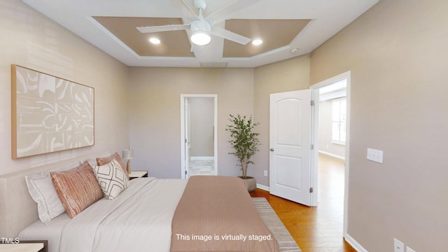 112 Salmon River Dr, Durham, NC 27705 - bedroom featuring wood finished floors and a ceiling fan