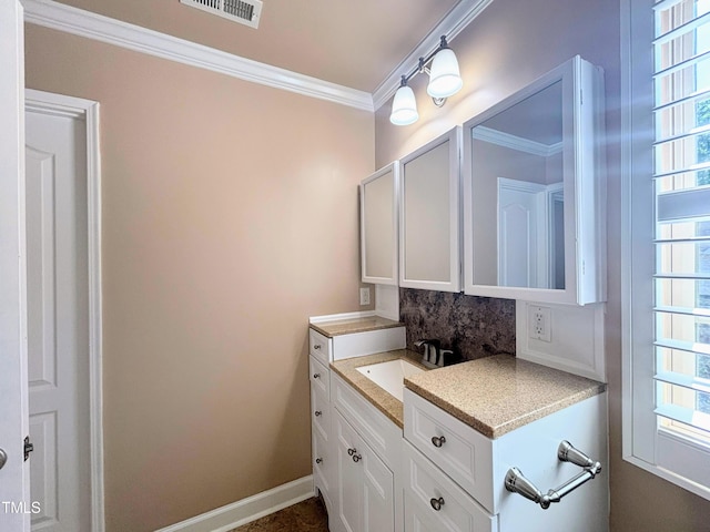 112 Salmon River Dr, Durham, NC 27705 - bathroom with vanity, backsplash, and crown molding