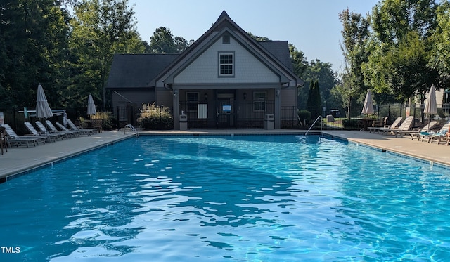 112 Salmon River Dr, Durham, NC 27705 - community pool with a patio