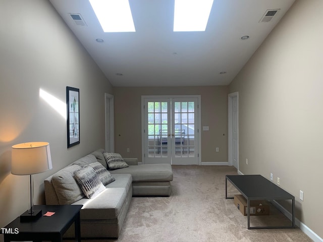 929 Morreene Rd Unit D-34, Durham, NC 27705 - carpeted living room featuring high vaulted ceiling and french doors