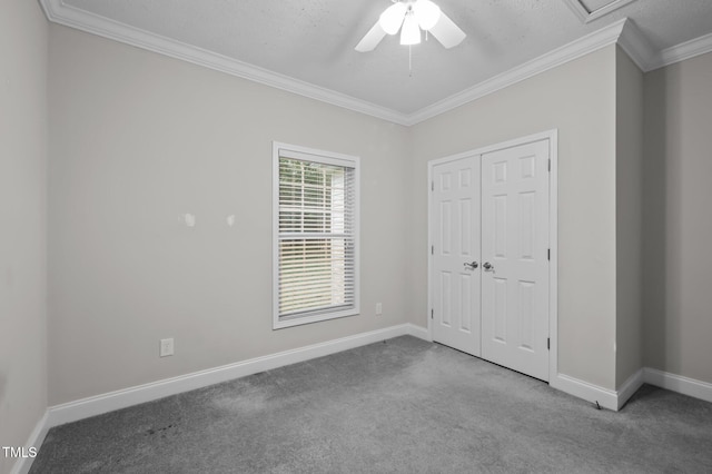 116 Justice St, Chapel Hill, NC 27516 - unfurnished bedroom with carpet floors, crown molding, a closet, and ceiling fan