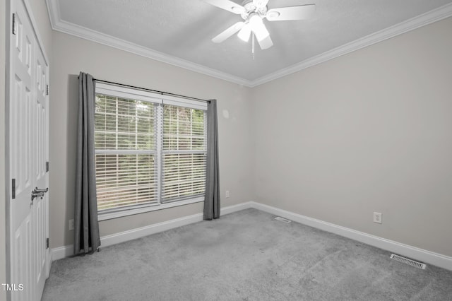 116 Justice St, Chapel Hill, NC 27516 - unfurnished room with crown molding, ceiling fan, and carpet