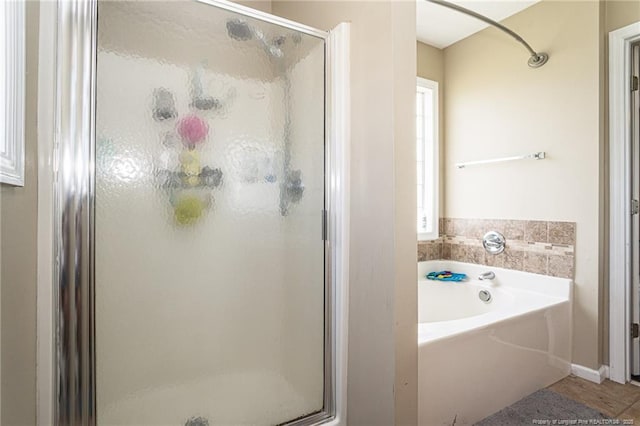 109 Hayes Ct, Raeford, NC 28376 - bathroom featuring a stall shower and a garden tub