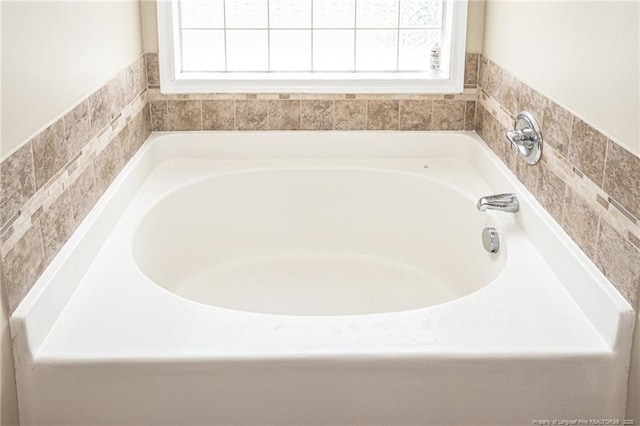 109 Hayes Ct, Raeford, NC 28376 - full bath featuring healthy amount of natural light and a garden tub