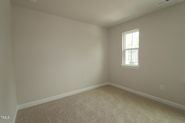 1218 Tredenham Way, Durham, NC 27703 - spare room featuring carpet flooring and baseboards