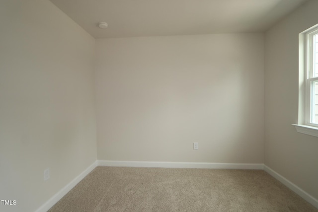 1218 Tredenham Way, Durham, NC 27703 - unfurnished room featuring carpet, healthy amount of natural light, and a smoke detector
