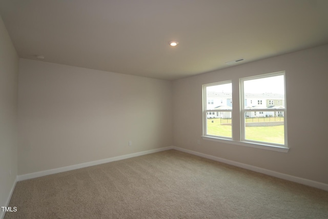 1218 Tredenham Way, Durham, NC 27703 - unfurnished room featuring light carpet, recessed lighting, and a smoke detector