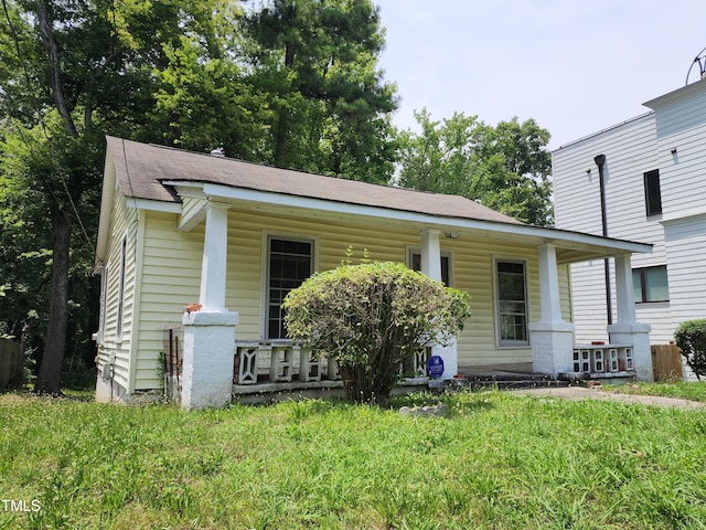 1106 Fargo St, Durham, NC 27707 - view of front of home with a porch and a shingled roof