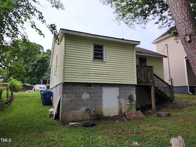 1106 Fargo St, Durham, NC 27707 - back of property featuring a yard and stairway
