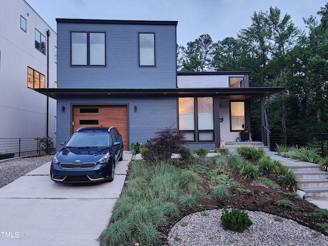 1106 Fargo St, Durham, NC 27707 - contemporary house with a garage, driveway, and a porch