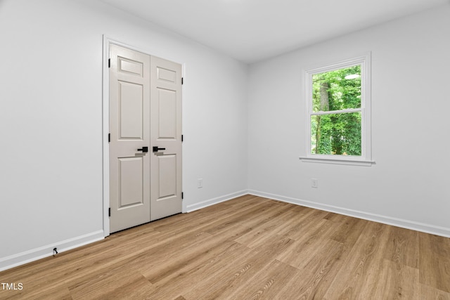 4349 Pickwick Dr, Raleigh, NC 27613 - empty room featuring light wood finished floors and baseboards