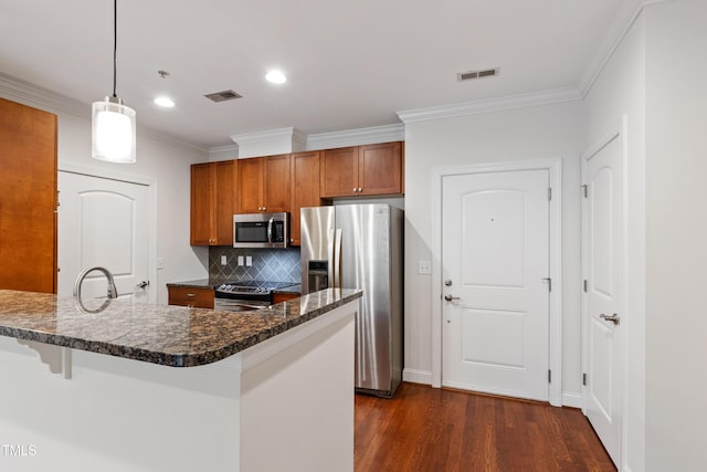 7250 NC-751 Hwy Unit 2204, Durham, NC 27707 - kitchen with appliances with stainless steel finishes, brown cabinetry, decorative backsplash, ornamental molding, and dark wood-type flooring