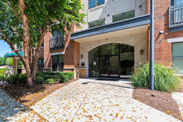 7250 NC-751 Hwy Unit 2204, Durham, NC 27707 - view of exterior entry featuring brick siding