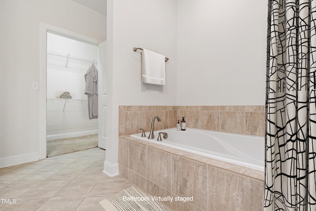 7250 NC-751 Hwy Unit 2204, Durham, NC 27707 - full bath featuring a garden tub, a spacious closet, and tile patterned floors
