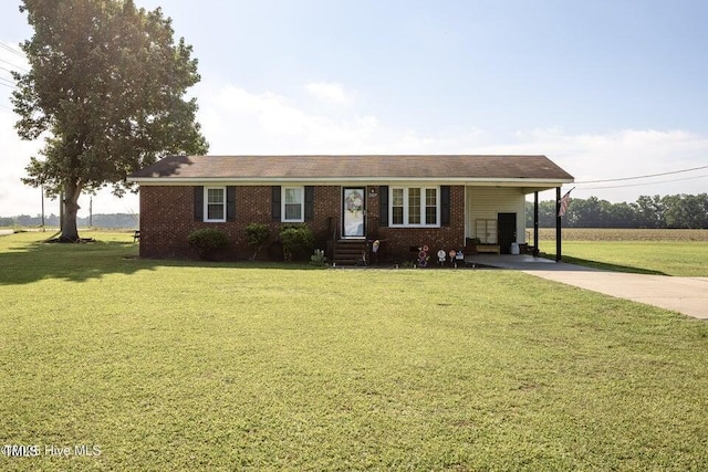 800 S Vance St, Fremont, NC 27830 - ranch-style house featuring concrete driveway, a carport, and a front lawn