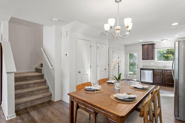 534 Hobkirks Pl, Durham, NC 27704 - dining space with stairs, a chandelier, light wood-type flooring, and recessed lighting
