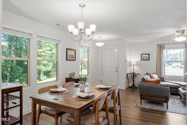 534 Hobkirks Pl, Durham, NC 27704 - dining area featuring healthy amount of natural light, dark wood finished floors, a chandelier, and ceiling fan